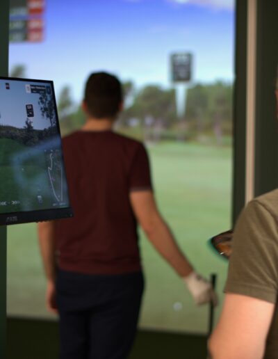 2 guys looking at screen